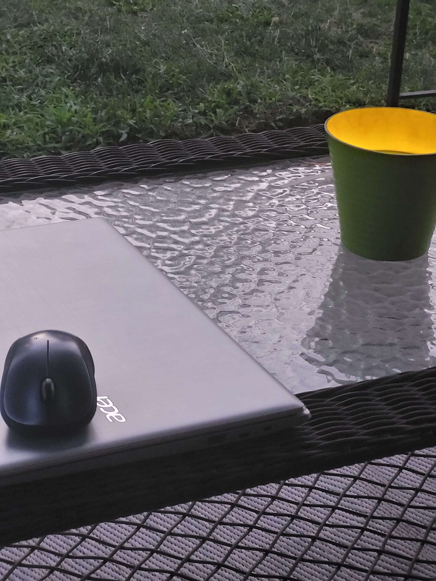 Laptop and Mouse on Patio Table