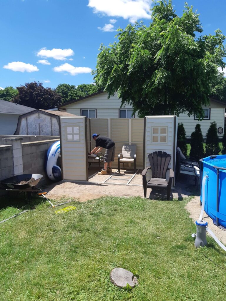 Backyard shed office under construction - walls up but no roof yet